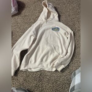 Ron Jon Cream Hoodie with Blue Logo